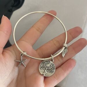 Silver tone charm earth sea star angel wing adjustable bracelet